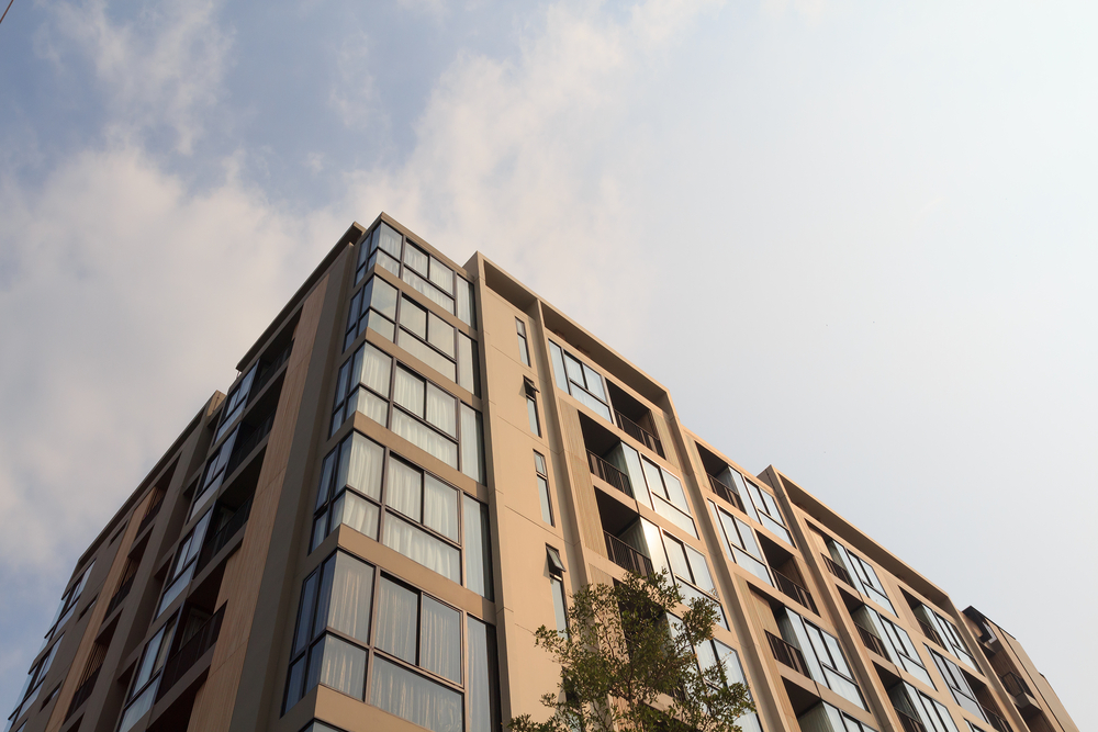 Close,Up,Of,Modern,Building,Condominium,With,Sky,Set,As Close,Up,Of,Modern,Building,Condominium,With,Sky,Set,As